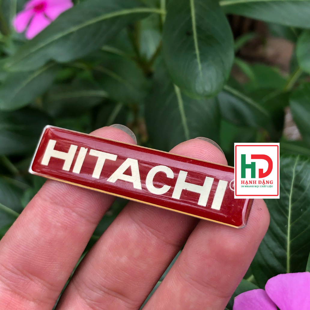 Tem Nhôm Đổ Keo Hitachi Nền Đỏ
